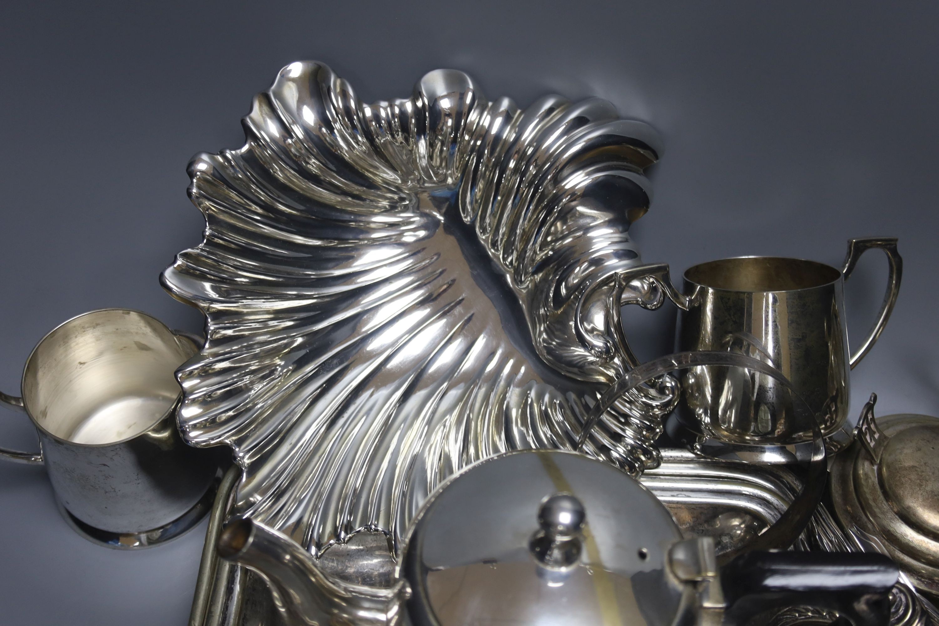 Assorted plated wares including hotel plate, entree dish and cover and claret jug mounts.